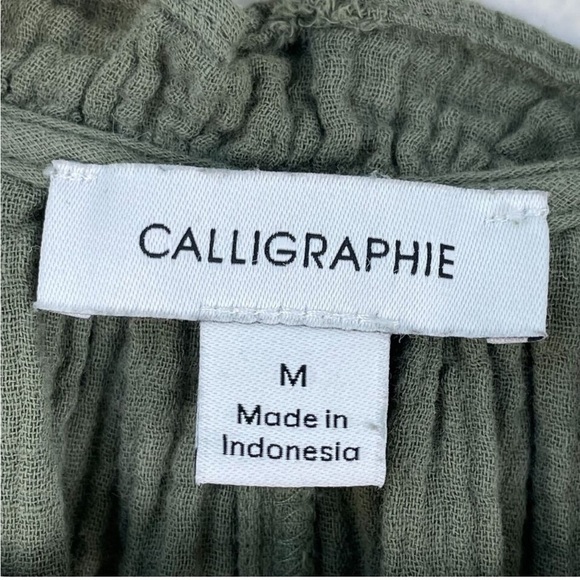 Calligraphie Women Medium
Green Seashell Tie Swing Tank Top
Sleeveless Shirt - Picture 4 of 9